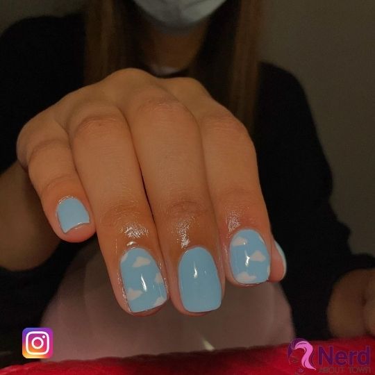 light blue nails with cloud design