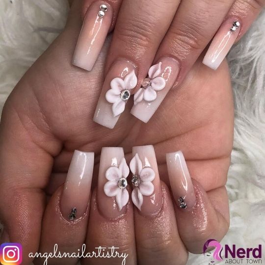 nude ombre nails with charms