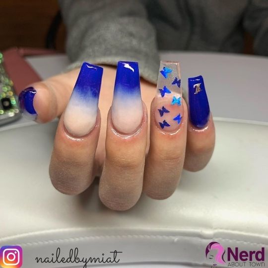 royal blue butterfly ombre nail design