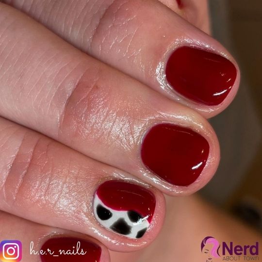 short red and cowprint nails