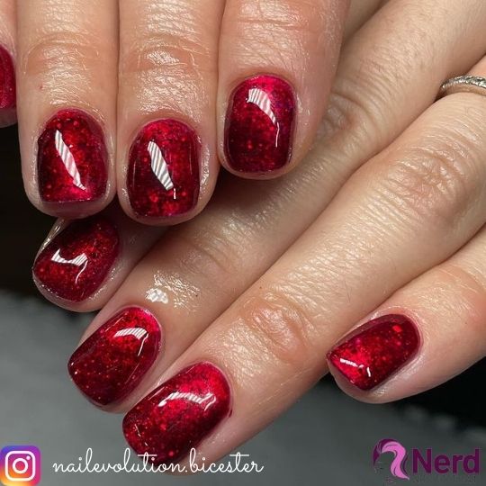 glittery short red nails