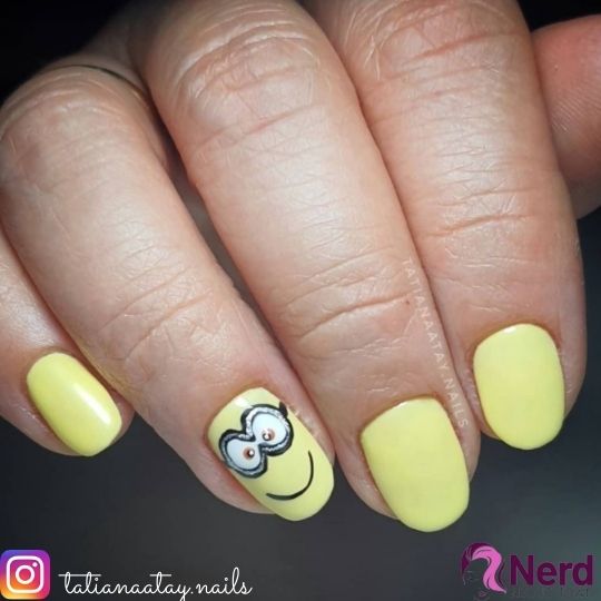 Minions yellow nail design