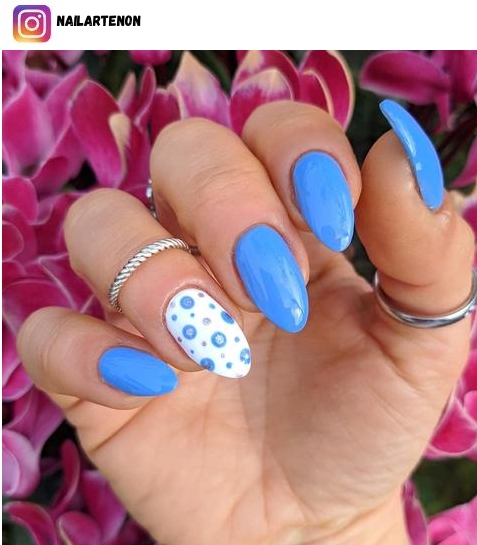 white and blue nail polish design