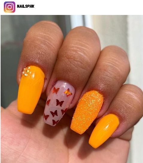 coffin orange nail polish design