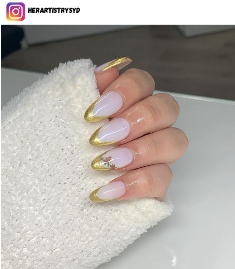 gold french tip nail polish design