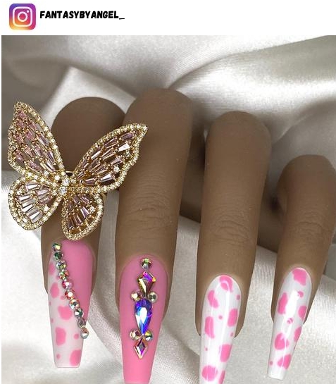 pink cow print nail design
