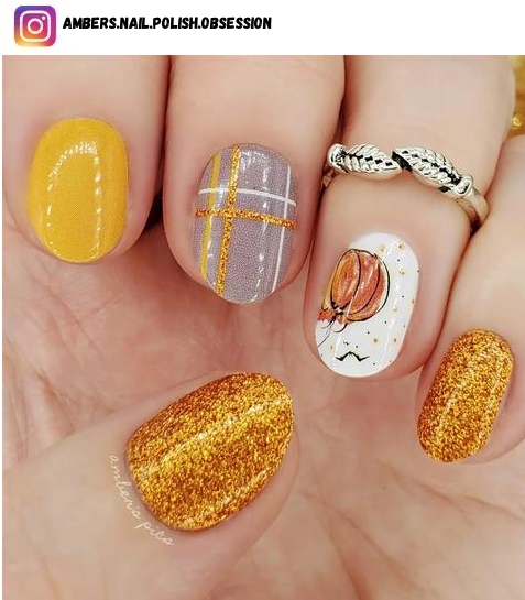 pumpkin nail polish design