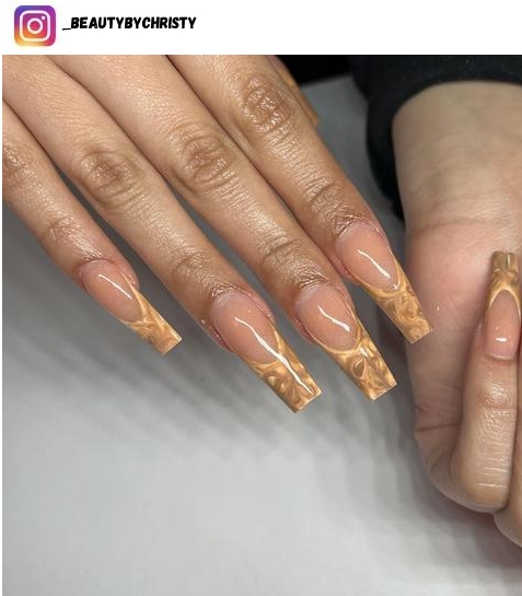brown french tip nail design