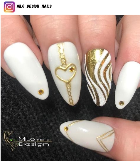 white and gold nail polish design
