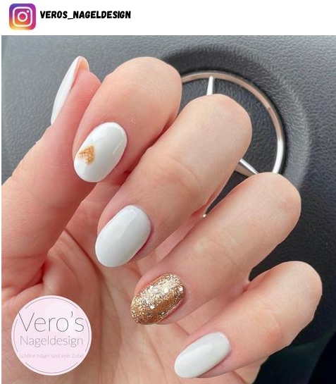 white and gold nail polish design