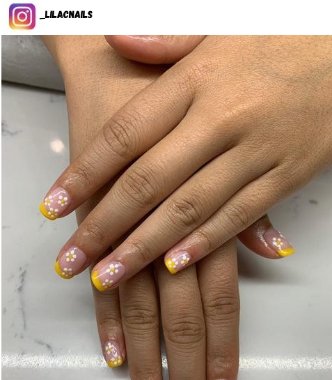yellow french tip nail art