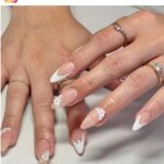 white flower nail design