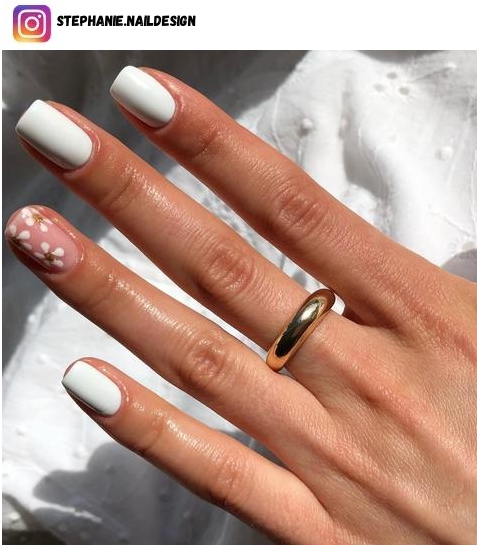 white flower nail polish design